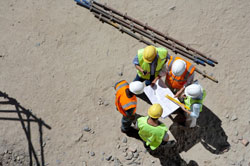 Construction workers planning